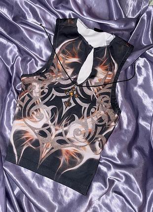 Нереальний рейв топ з трайблами від urban outfitters