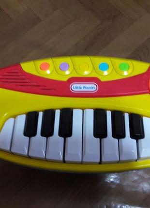 Пианино игрушечное музыкальное.