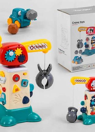 Музыкальная игра 2158 (12) "подъемный кран" с подсветкой, звуком и 4 игровыми камешками, английская озвучка,