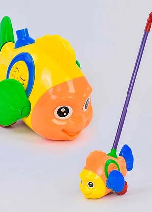 Каталка 0366 (96/2) «рибка» на паличці з брязкальцем, що рухає плавниками, в пакеті