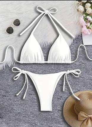 Продам новий білий купальник,  розмір s-m