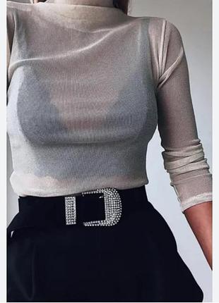 Сріблястий прозорий лонгслів із блискучої сітки