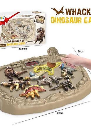 Музична стукалка-динозавр 3697 (24) з підсвічуванням у яскравій коробці