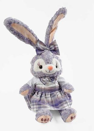 Герой m 18240 (50) высотой 36 см, с бантиком, в платье, сидящий