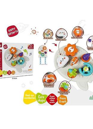 Развивающая доска 99-23 (48) «ракета» с пластиковыми ремешками, погремушкой, спиннером, рычагом и шестью