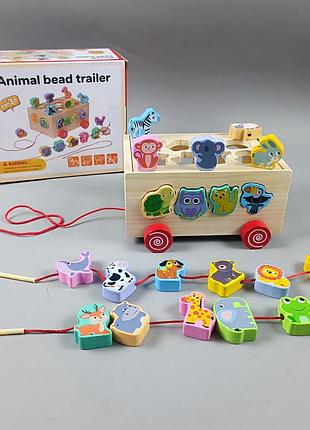 Дерев'яна іграшка каталка сортер з тваринами арт. c15035 сортер каталка в коробці 20, 5*18*10, 5см