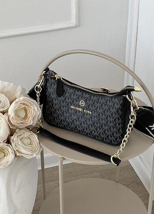 Сумка michael kors jet set charm чорний є