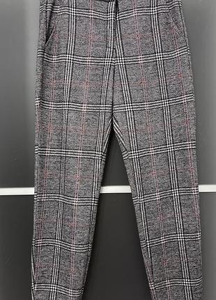 Штани в клітинку