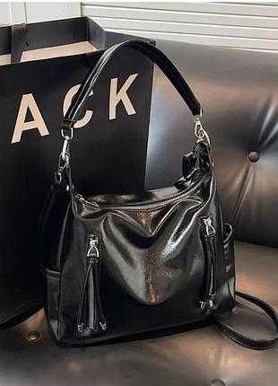 Женская сумка из лаковой экокожи черного цвета