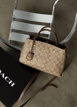 Сумка женская coach через плечо бежевый е