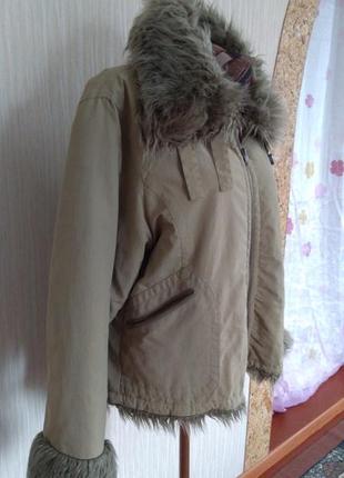 Тепла зимова куртка 64 р.2 фото