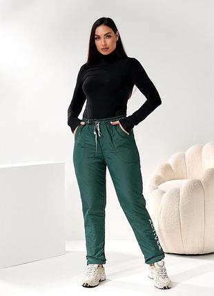 Жіночі спортивні теплі плащові на сентипоні гірські лижні штани брюки