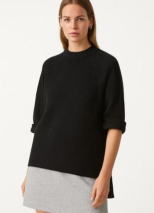 Вовняний стильний чорний светр кос