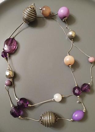Довге кольє з різними намистинами