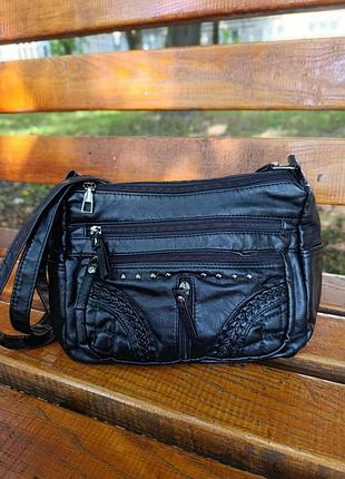 Женская сумочка черного цвета на каждый день.