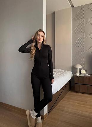 Утеплений комбінезон на потаємній блискавці