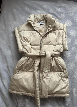 Жіноча безрукавка, жилетка