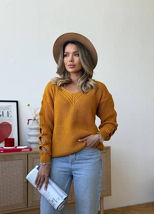 Жіночий светр з оригінальними прорізами на рукавах кольори в асортименті