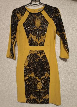 Сукня жовта з чорними паєтками