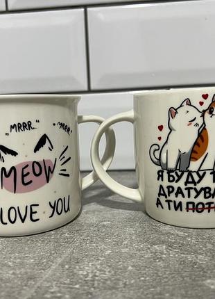 Дві чашки з котиками