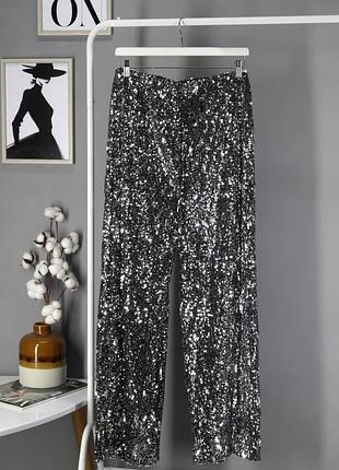 Новые нарядные брюки, штаны черные в серебристых пайетках "tu", uk12.