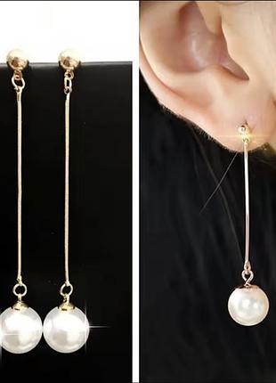 Елегантні сережки з перлами.
