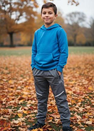 Щільні вологозахисні штани 9-10 років gap