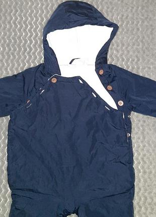 Дитячий комбінезон.фірма h&m.підійде на дитину зростом 62см.2-4місяці.зовні плащівка,в середині на флісі.має капюшон,усі застібки справні.