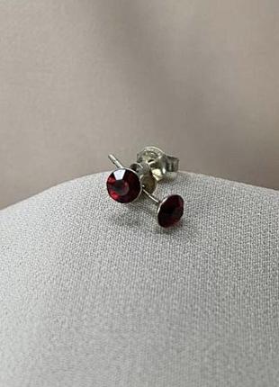 Срібні сережки пуссети з червоними фіанітами