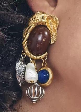 Массивные серьги многофигурные с несколькими подвесными элементами