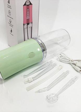 Ирригатор для чистки зубов и полости рта oral irrigator с аккумулятором и сменными насадками. цвет: зеленый wo-60