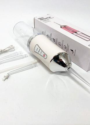 Ирригатор для чистки зубов и полости рта oral irrigator с аккумулятором и сменными насадками. цвет: белый zy-42