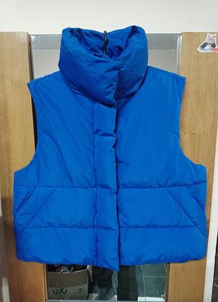 Женская жилетка