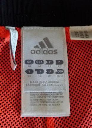 Жіноча біла спортивна куртка Preto adidas.9 фото