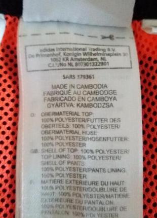 Жіноча біла спортивна куртка Preto adidas.10 фото