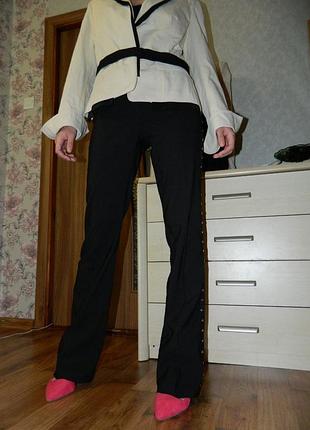 Брюки клеш с заклепками