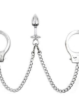 Наручники с цепями и анальной пробкой one size серебристый k000162