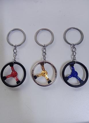 Брелоки для в'язки ключів зокрема водіям автолюбителям в асортименті у формі керма