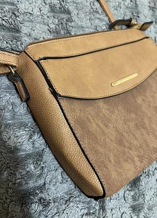 Сумочка зміїним принтом