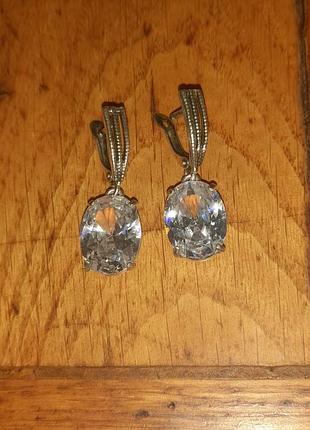 Сяючі сережки з великими каменями натурального гірського кришталю 12×16 мм, мельхіор у посрібленні