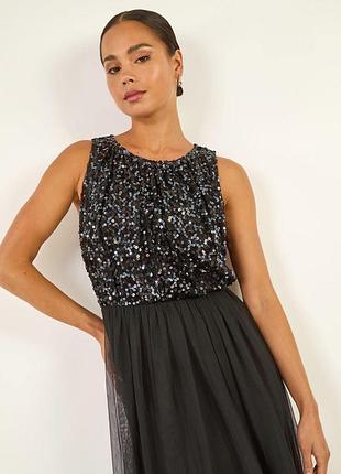 Вечірня блискуча сукня з паєтками