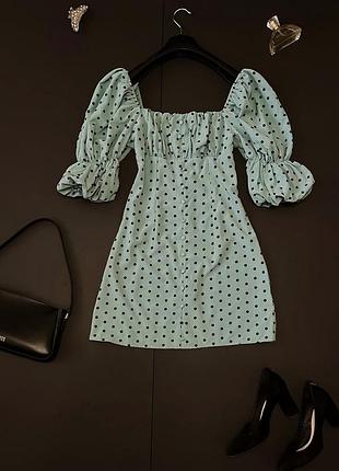 Сачткова сукня мʼятного кольору,в горошок,з рукавами воланами