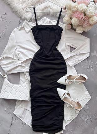 Витончена фігурна сукня міді