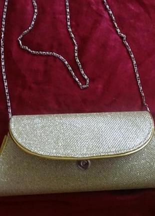 Новый золотистый клатч