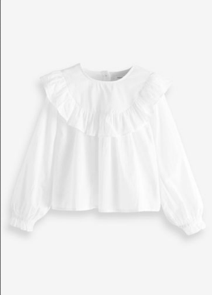 Біла бавовняна блузка з рюшами від next на 9 років