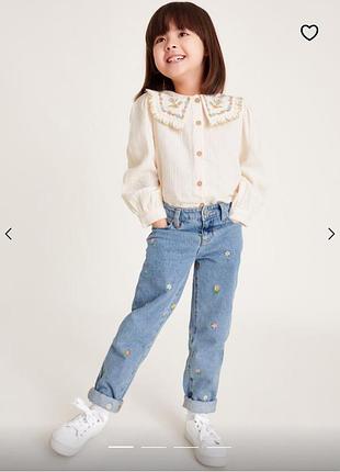 Джинсы с вышивкой