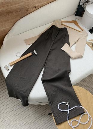 Широкі коричневі штани в клітинку h&m