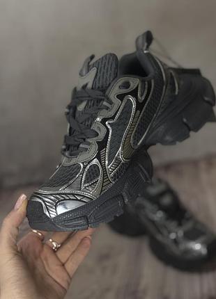 Кросівки в стилі відомого бренду 3xl сірого срібного кольору