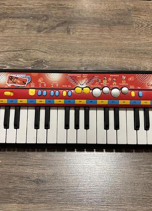 Дитячий синтезатор, піаніно