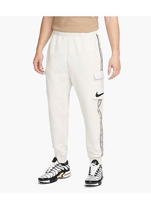 Чоловічі утеплені спортивні штани кольору слонової кістки від  nike  розмір s оригінал